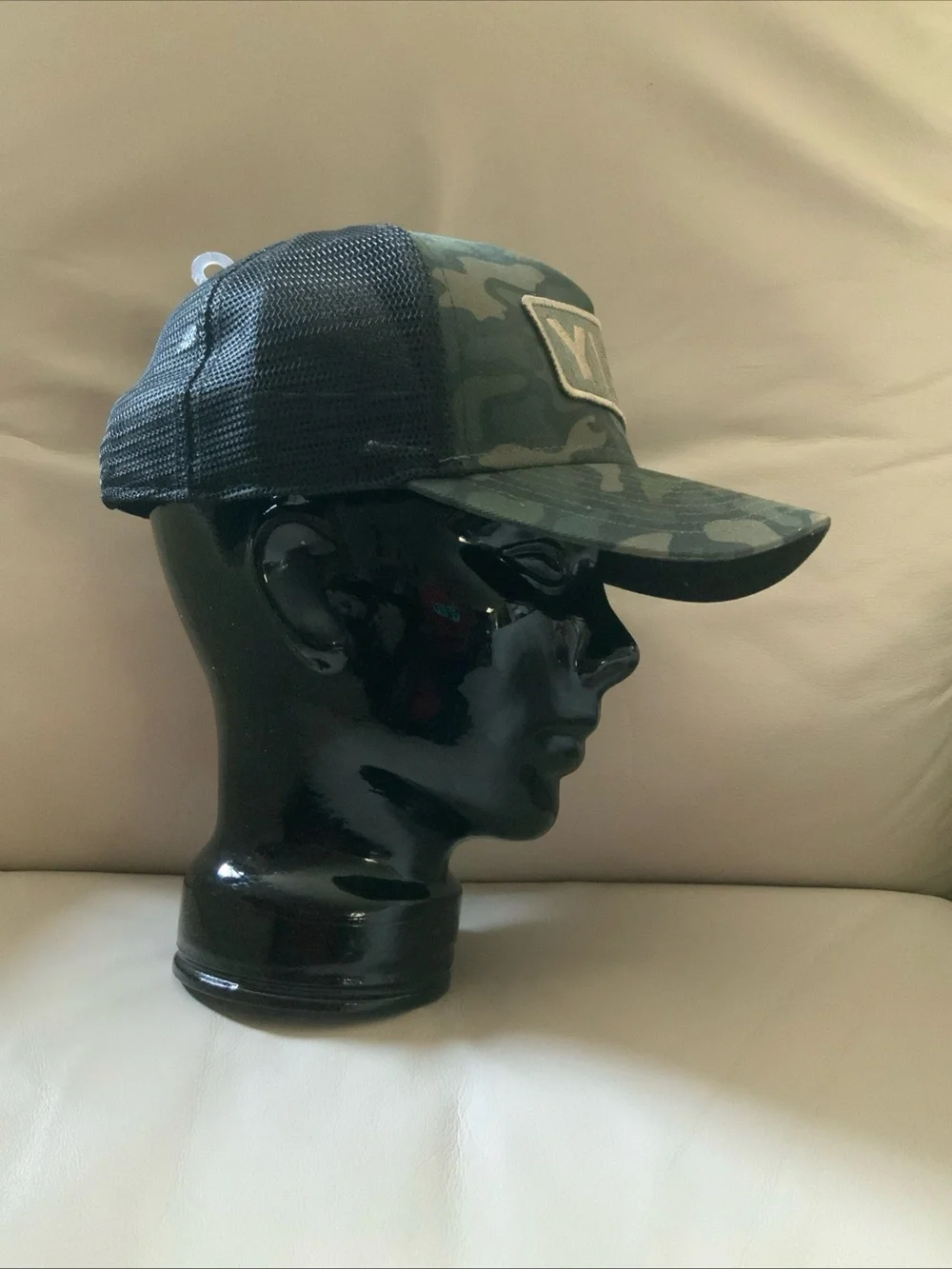 Yeti Green Camo Patch Trucker hunting Cap. Mesh and adjustable strap. NWOT.